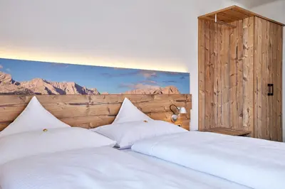 Ein Bett oder Betten in einem Zimmer der Unterkunft Gästehaus Angela