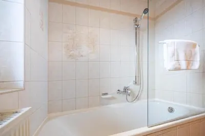 Ein Badezimmer in der Unterkunft Gästehaus Kochelsee