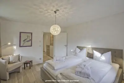 Ein Bett oder Betten in einem Zimmer der Unterkunft Ferienhaus Alpenjuwel