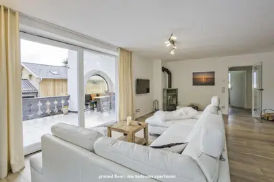 Ein Sitzbereich in der Unterkunft Ferienhaus Alpenjuwel