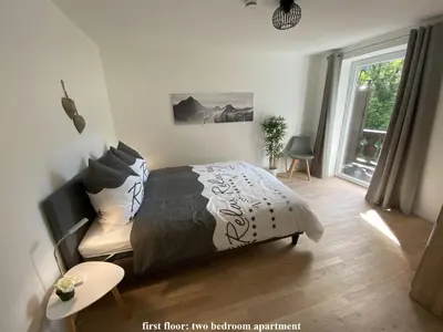 Ein Bett oder Betten in einem Zimmer der Unterkunft Ferienhaus Alpenjuwel