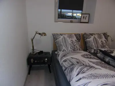 Ein Bett oder Betten in einem Zimmer der Unterkunft Stadthaus Kaufbeuren