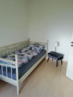 Ein Bett oder Betten in einem Zimmer der Unterkunft Stadthaus Kaufbeuren
