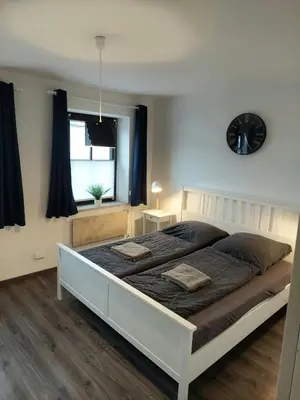Ein Bett oder Betten in einem Zimmer der Unterkunft Lech Appartement