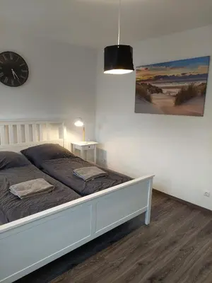Ein Bett oder Betten in einem Zimmer der Unterkunft Lech Appartement