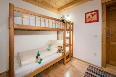 Ein Bett oder Betten in einem Zimmer der Unterkunft Wimmerhof