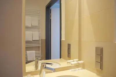 Ein Badezimmer in der Unterkunft Augusten Hotel München