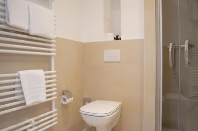 Ein Badezimmer in der Unterkunft Augusten Hotel München