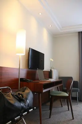 TV/Unterhaltungsangebot in der Unterkunft Augusten Hotel München