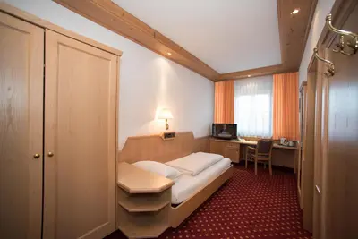 Ein Bett oder Betten in einem Zimmer der Unterkunft Hotel und Gasthof Soller