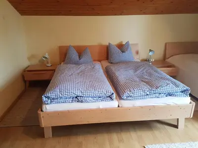 Ein Bett oder Betten in einem Zimmer der Unterkunft Gästehaus Annemarie