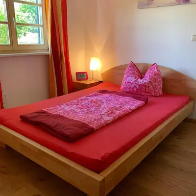 Ein Bett oder Betten in einem Zimmer der Unterkunft Apartment with a stunning view of the alps - Wohnung mit atemberaubenden Blick auf die Alpen