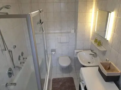 Ein Badezimmer in der Unterkunft Ferienwohnungen Haus am See