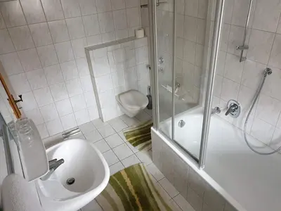 Ein Badezimmer in der Unterkunft Ferienwohnungen Haus am See