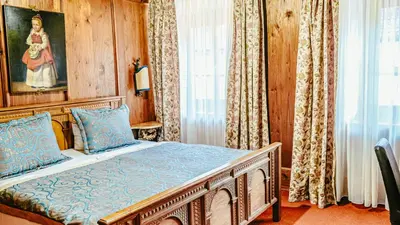 Ein Bett oder Betten in einem Zimmer der Unterkunft Atlas Grand Hotel