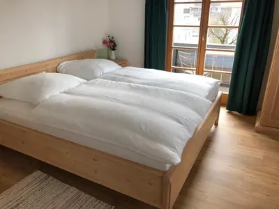 Ein Bett oder Betten in einem Zimmer der Unterkunft Landgasthaus zum Altwirt Reichersbeuern