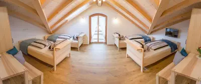 Ein Bett oder Betten in einem Zimmer der Unterkunft Pension Baumgartner
