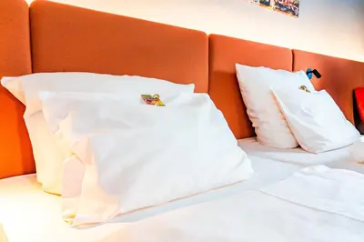 Ein Bett oder Betten in einem Zimmer der Unterkunft Stay2Munich Hotel & Serviced Apartments