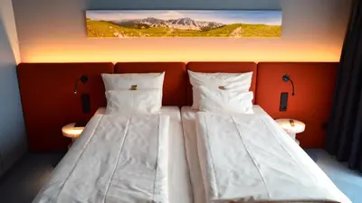 Ein Bett oder Betten in einem Zimmer der Unterkunft Stay2Munich Hotel & Serviced Apartments