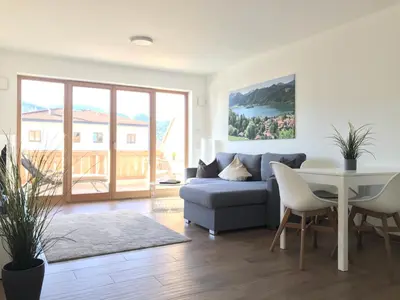 Ein Sitzbereich in der Unterkunft Apartment Berg und See