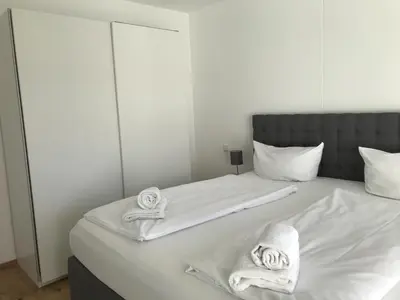 Ein Bett oder Betten in einem Zimmer der Unterkunft Apartment Berg und See