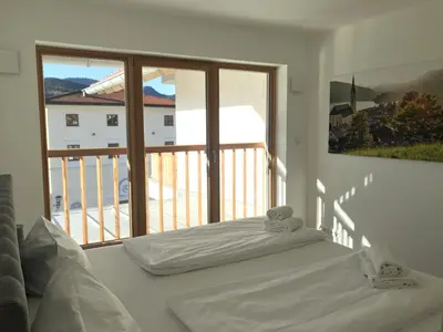 Ein Bett oder Betten in einem Zimmer der Unterkunft Apartment Berg und See