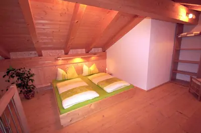 Ein Bett oder Betten in einem Zimmer der Unterkunft Ferienwohnungen Bergerhof Zuhaus