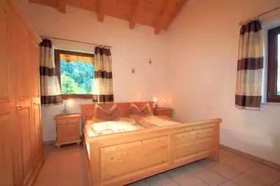 Ein Bett oder Betten in einem Zimmer der Unterkunft Ferienwohnungen Bergerhof Zuhaus