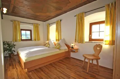 Ein Bett oder Betten in einem Zimmer der Unterkunft Ferienwohnungen Bergerhof