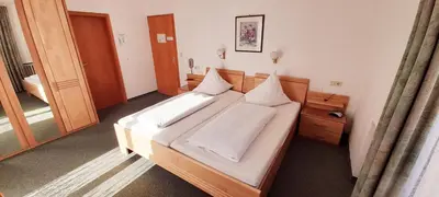 Ein Bett oder Betten in einem Zimmer der Unterkunft Hotel Seemüller