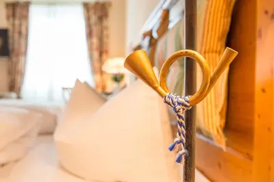 Ein Bett oder Betten in einem Zimmer der Unterkunft Hotel Post Murnau