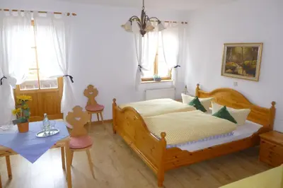Ein Bett oder Betten in einem Zimmer der Unterkunft Landgasthof Berg