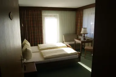 Ein Bett oder Betten in einem Zimmer der Unterkunft Gästehaus Charlotte