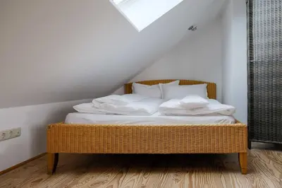 Ein Bett oder Betten in einem Zimmer der Unterkunft Roger`s Ferienwohnung