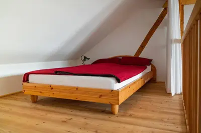 Ein Bett oder Betten in einem Zimmer der Unterkunft Roger`s Ferienwohnung
