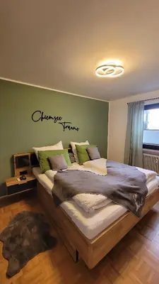 Ein Bett oder Betten in einem Zimmer der Unterkunft Ferienwohnung Hedy