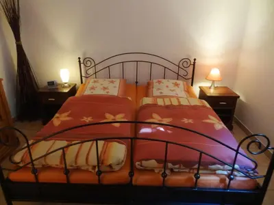 Ein Bett oder Betten in einem Zimmer der Unterkunft Ferienwohnung Frühauf