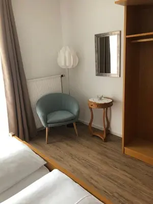 Ein Bett oder Betten in einem Zimmer der Unterkunft Gästehaus Bauer am Golfplatz