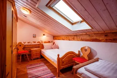 Ein Bett oder Betten in einem Zimmer der Unterkunft Großhuberhof