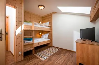 Ein Bett oder Betten in einem Zimmer der Unterkunft Großhuberhof