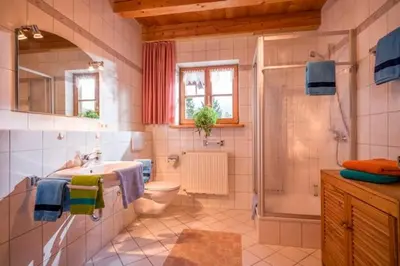 Ein Badezimmer in der Unterkunft Großhuberhof