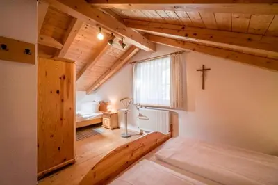 Ein Bett oder Betten in einem Zimmer der Unterkunft Großhuberhof
