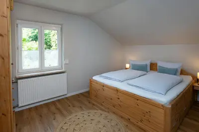 Ein Bett oder Betten in einem Zimmer der Unterkunft Pension Elisa