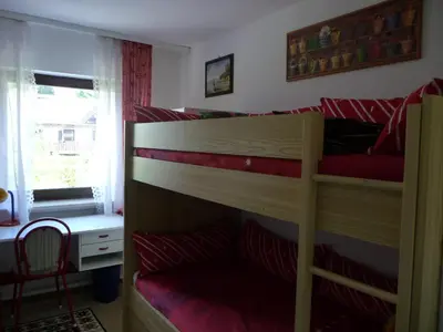 Ein Bett oder Betten in einem Zimmer der Unterkunft Ferienhaus Werthmann