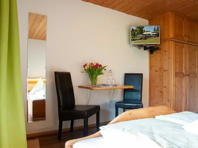 Ein Bett oder Betten in einem Zimmer der Unterkunft Gästehaus Webermohof