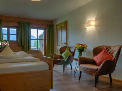 Ein Sitzbereich in der Unterkunft Gästehaus Webermohof