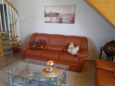 Ein Sitzbereich in der Unterkunft Ferienwohnung Wolfersdorf