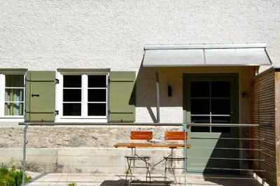 Ein Balkon oder eine Terrasse in der Unterkunft Spitzing Lodge Ferienwohnungen - Wanderparadies in den Bergen