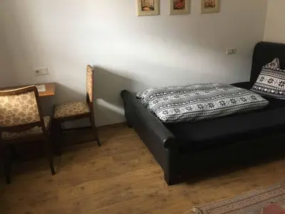 Ein Bett oder Betten in einem Zimmer der Unterkunft Pension zur Schmied'n