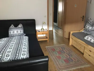 Ein Bett oder Betten in einem Zimmer der Unterkunft Pension zur Schmied'n